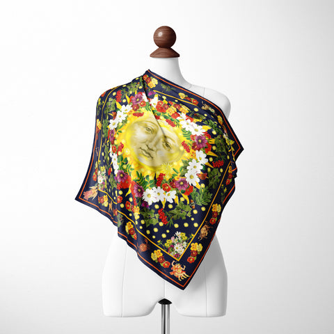 Introducing the Exquisite Astrology: The Sun God Organic Silk Twill Scarf – a luxurious accessory with rich yellow tones, bursts of vibrant colours, and symbolic Zodiac designs. 