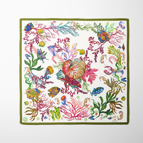 Underwater Paradise Silk Twill Scarf featuring vibrant marine illustrations and a Nautilus shell